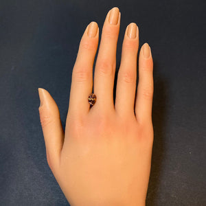 oval fancy tanzanite gem orange pink