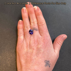 oval tanzanite on hand size