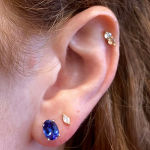 oval cut tanzanite stud earring white gold