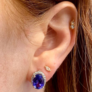 white gold oval tanzanite stud earrings diamonds