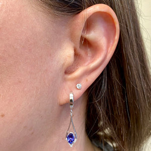 oval cut tanzanite diamond white gold earrings