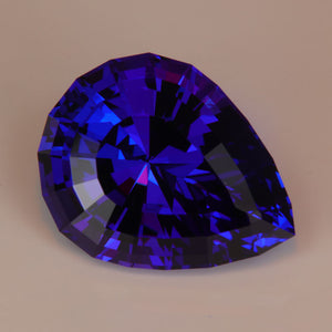 pear shape beautiful tanzanite gemstone with red flash