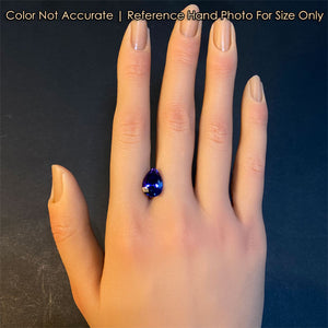 tanzanite pear shape cut on hand