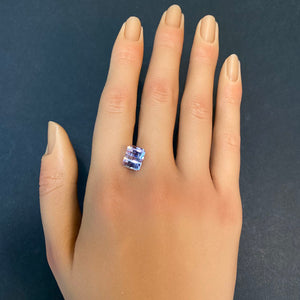 rare fancy tanzanite gemstone on hand