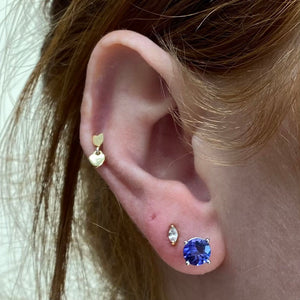 round cut tanzanite stud earrings white gold