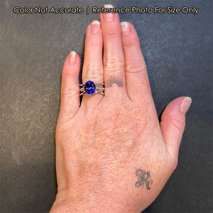 oval cut tanzanite gemstone ring with diamonds
