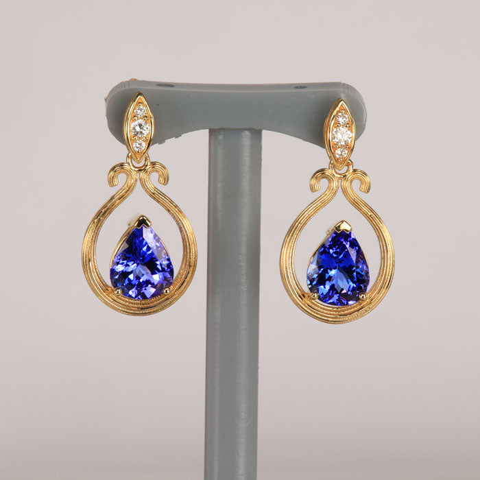 yellow gold diamond tanzanite earrings pear shape gemstone