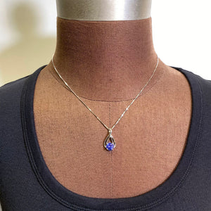 round tanzanite drop white gold