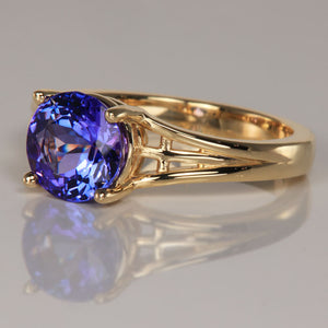 round brilliant tanzanite ring yellow gold