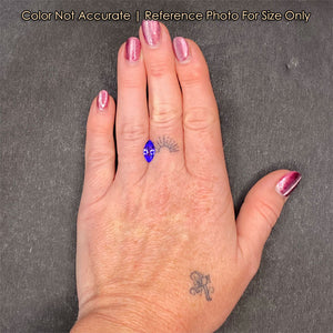 tanzanite gemstone on hand