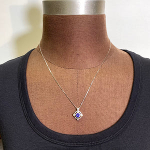 white gold round tanzanite diamond pendant
