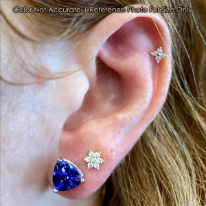 trilliant tanzanite white gold studs on ear