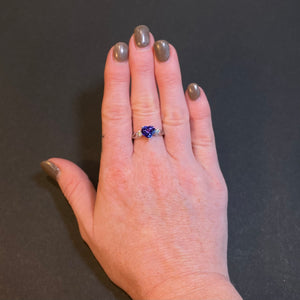 white gold tanzanite heart shaped ring with diamonds