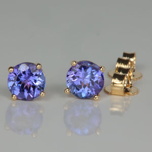 tanzanite studs in yellow gold round brilliant cut