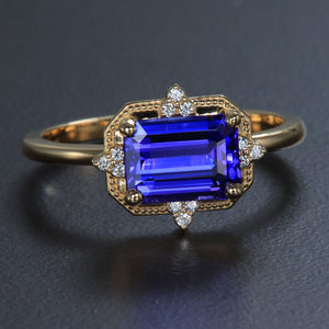 Yellow Gold Emerald Cut Tanzanite and Diamond Ring