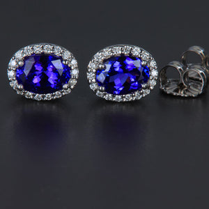 White Gold Oval Tanzanite and Diamond Halo Earrings
