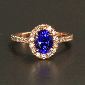 Rose Gold Oval Tanzanite and Diamond Halo Ring