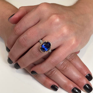 Large Platinum and 14k Rose Gold Oval Tanzanite Halo Ring 7.50 Carats