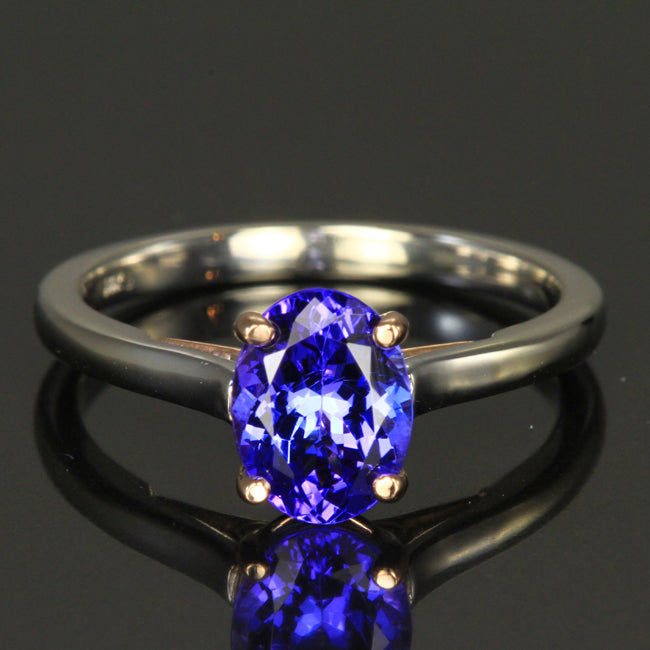 0.68ct oval tanzanite 14k white and rose gold ring