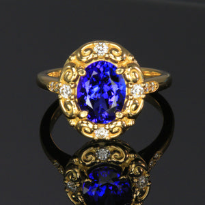 18k Yellow gold oval tanzanite and diamond ring