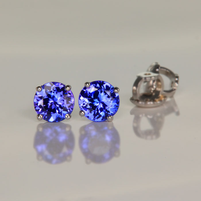 Round four prong tanzanite earrings Screw Back white gold