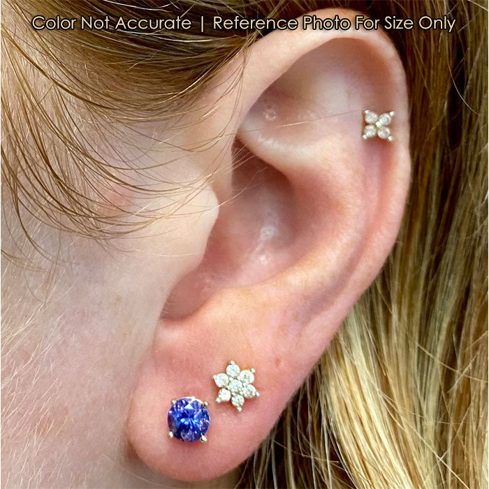 tanzanite gemstone earrings in yellow gold