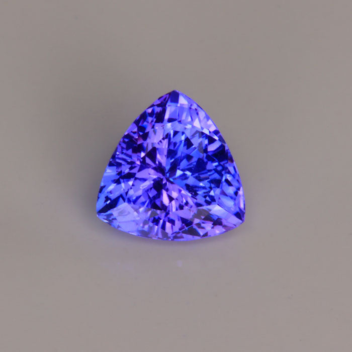blue violet tanzanite gemstone trilliant cut 