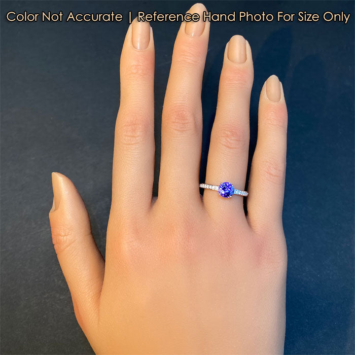 diamond and tanzanite gemstone ring on hand