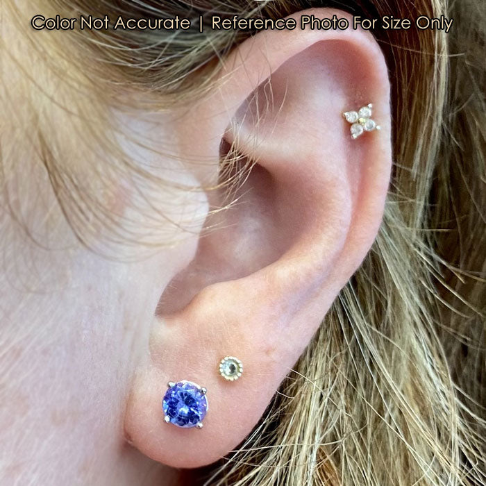 tanzanite and white gold earrings round brilliant cut