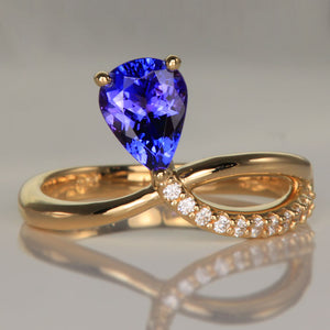 1.23ct Pear Shape Tanzanite and Diamond Ring in 14k Yellow Gold