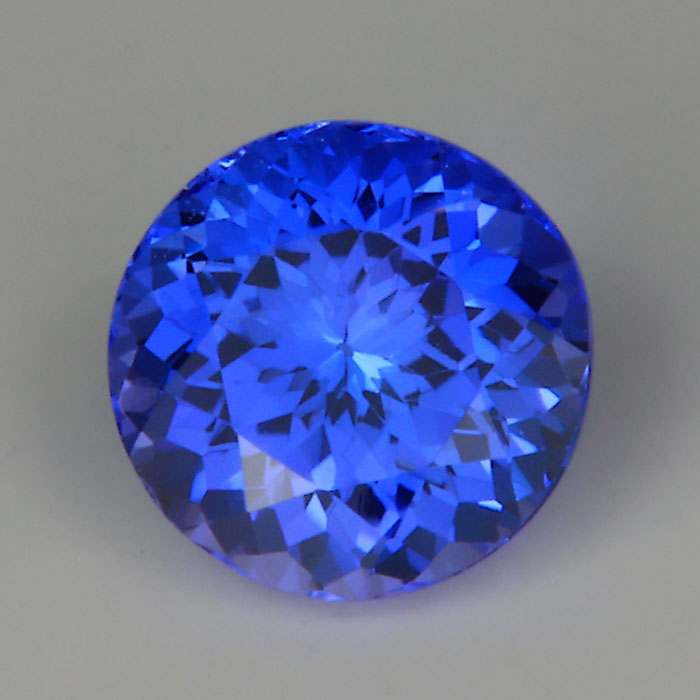 round brilliant cut tanzanite gemstone mostly blue color