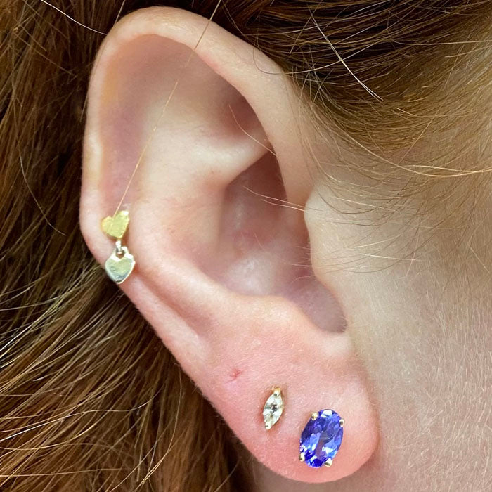 tanzanite stud earrings yellow gold oval cut