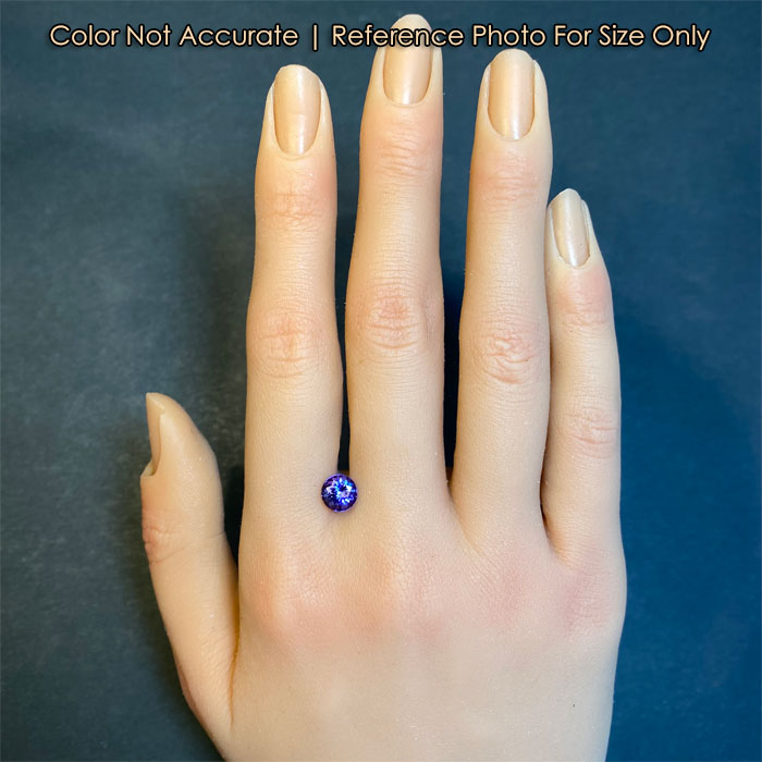 round brilliant cut tanzanite size to hand