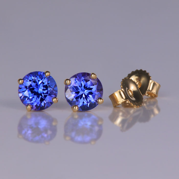 violet blue tanzanite earrings in yellow gold