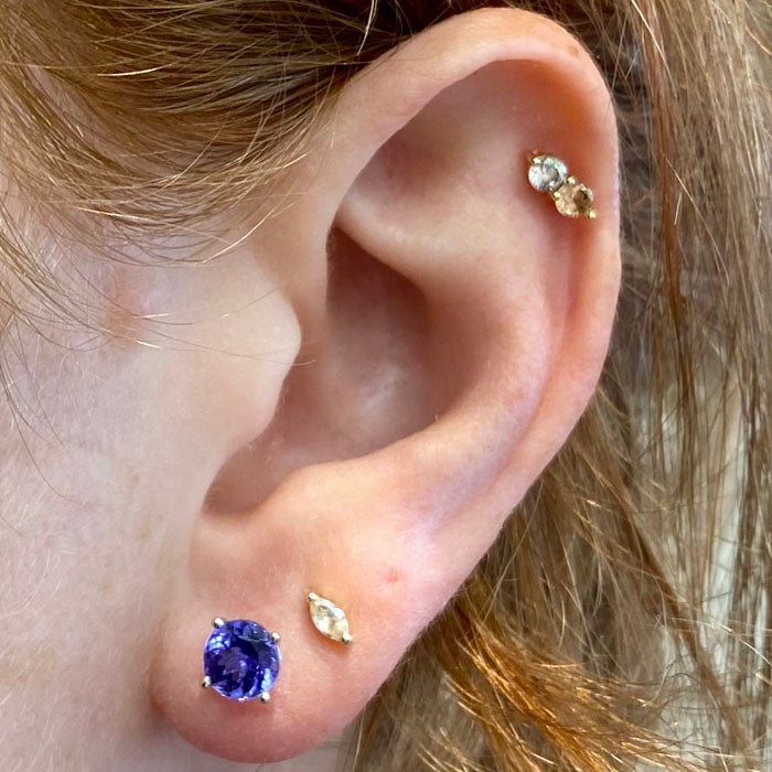 round tanzanite stud earrings