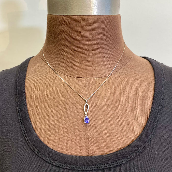 pear shape tanzanite drop pendant white gold