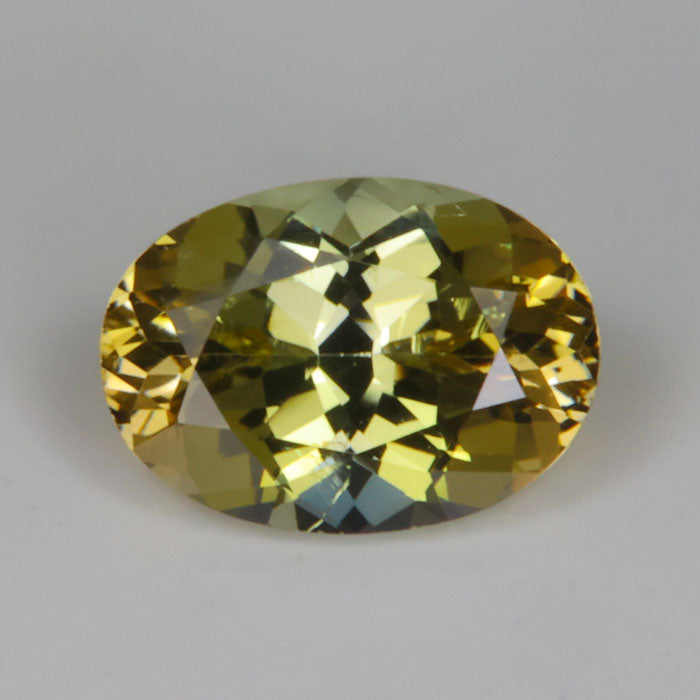 greenish yellow oval cut fancy tanzanite 