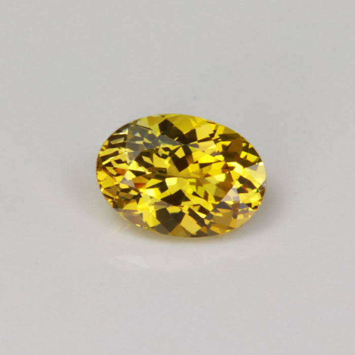 fancy tanzanite yellow golden oval cut gemstone