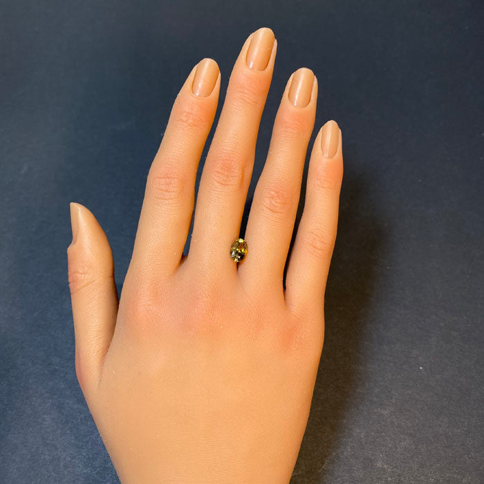 oval cut fancy golden tanzanite gem
