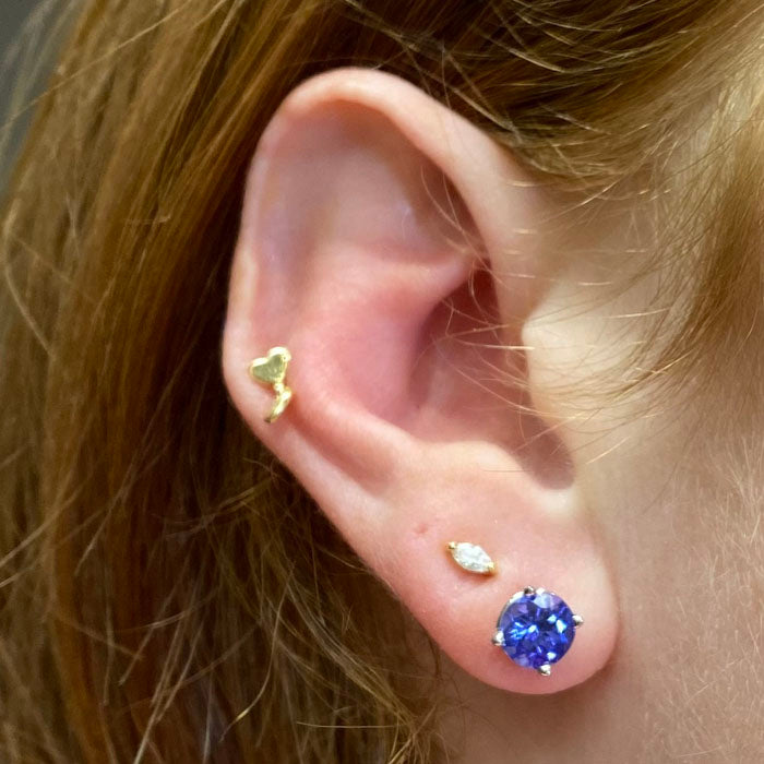 round brilliant tanzanite studs white gold