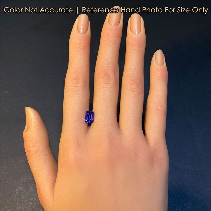 tanzanite gem mostly violet on hand
