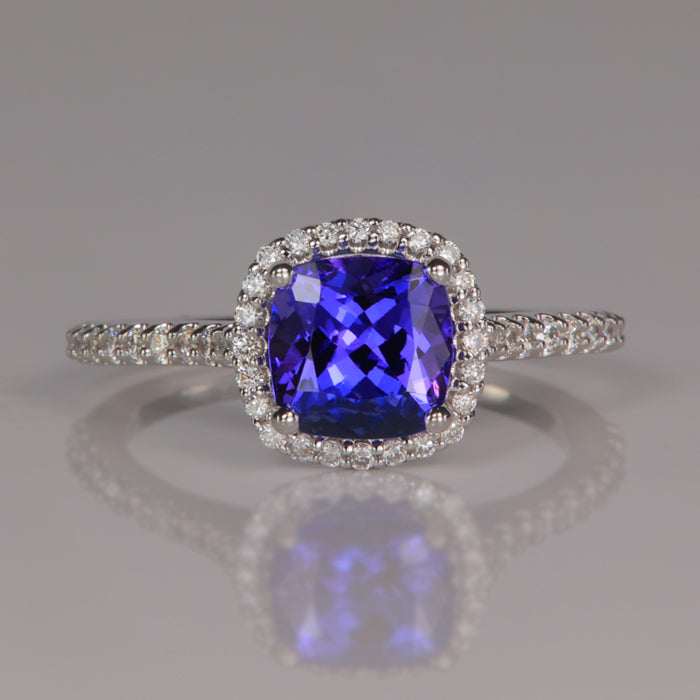 blue violet tanzanite gemstone ring with diamonds in white gold