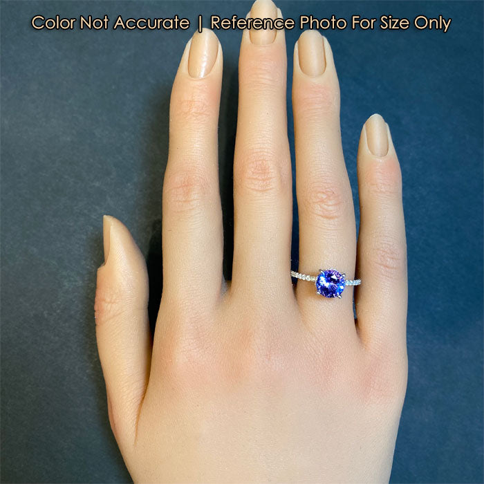 white gold tanzanite and diamond ring