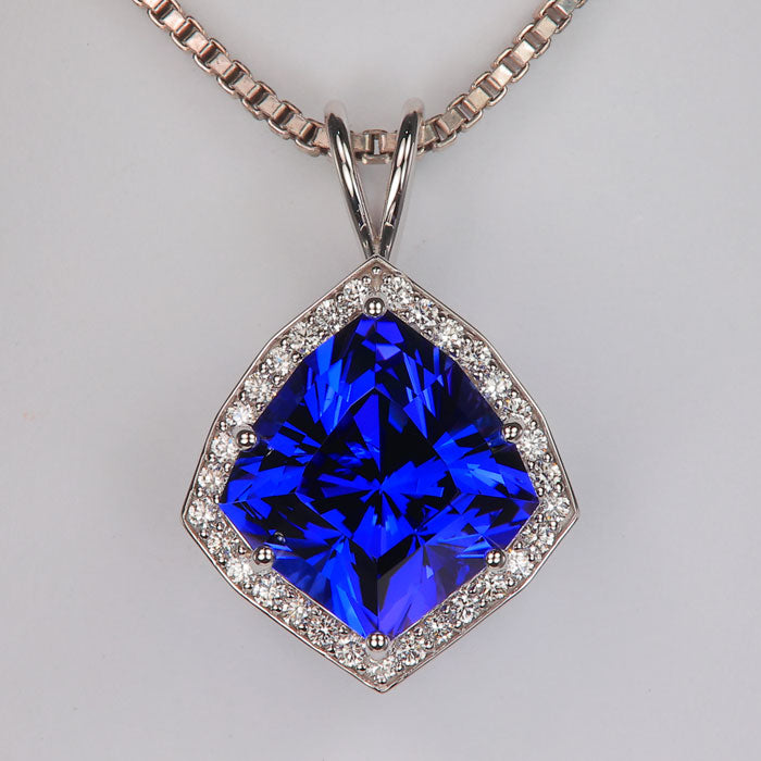 violet blue kite brilliant cut tanzanite gemstone pendant in white gold with diamonds