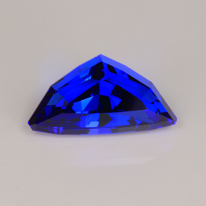 mostly blue step shield cut tanzanite rare gem