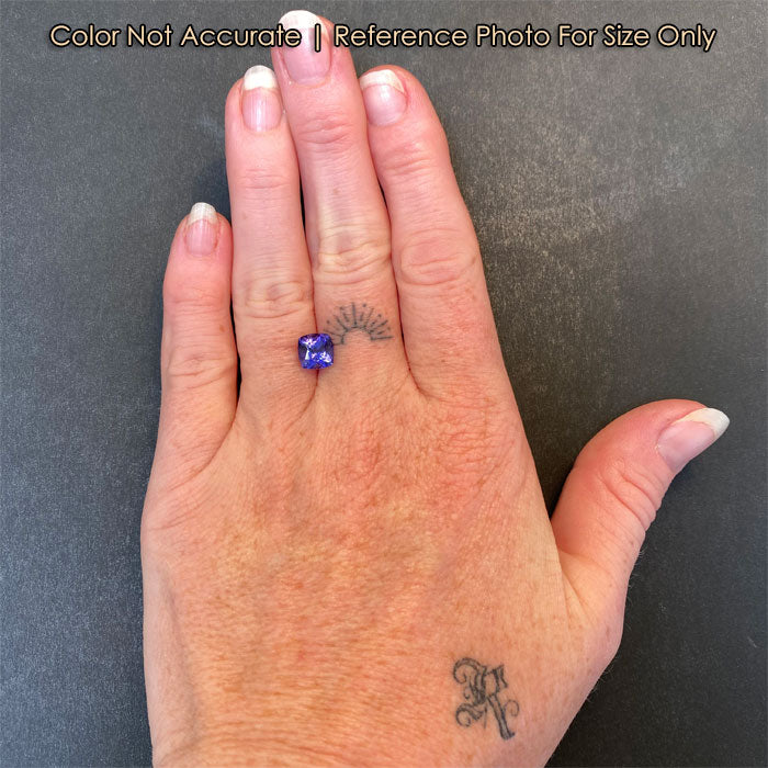 size of 2.10ct tanzanite to hand