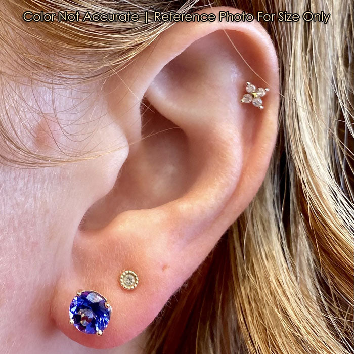 tanzanite violet blue studs on ear