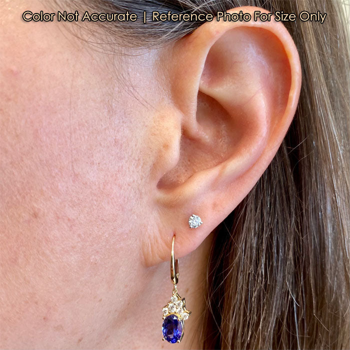 yellow gold and oval tanzanite and diamond earrings size 