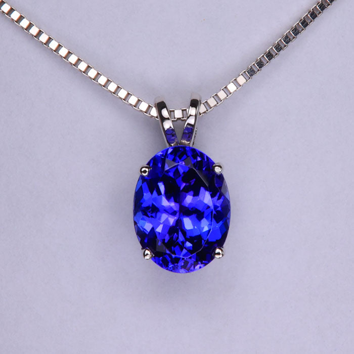 solitaire oval tanzanite necklace in 14k white gold