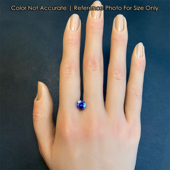round brilliant tanzanite on a hand
